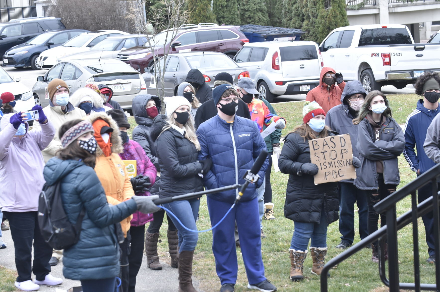 Crowd of dozens gathers at Echo Veterans Memorial Park in Burlington for Black Education Matters Demonstration